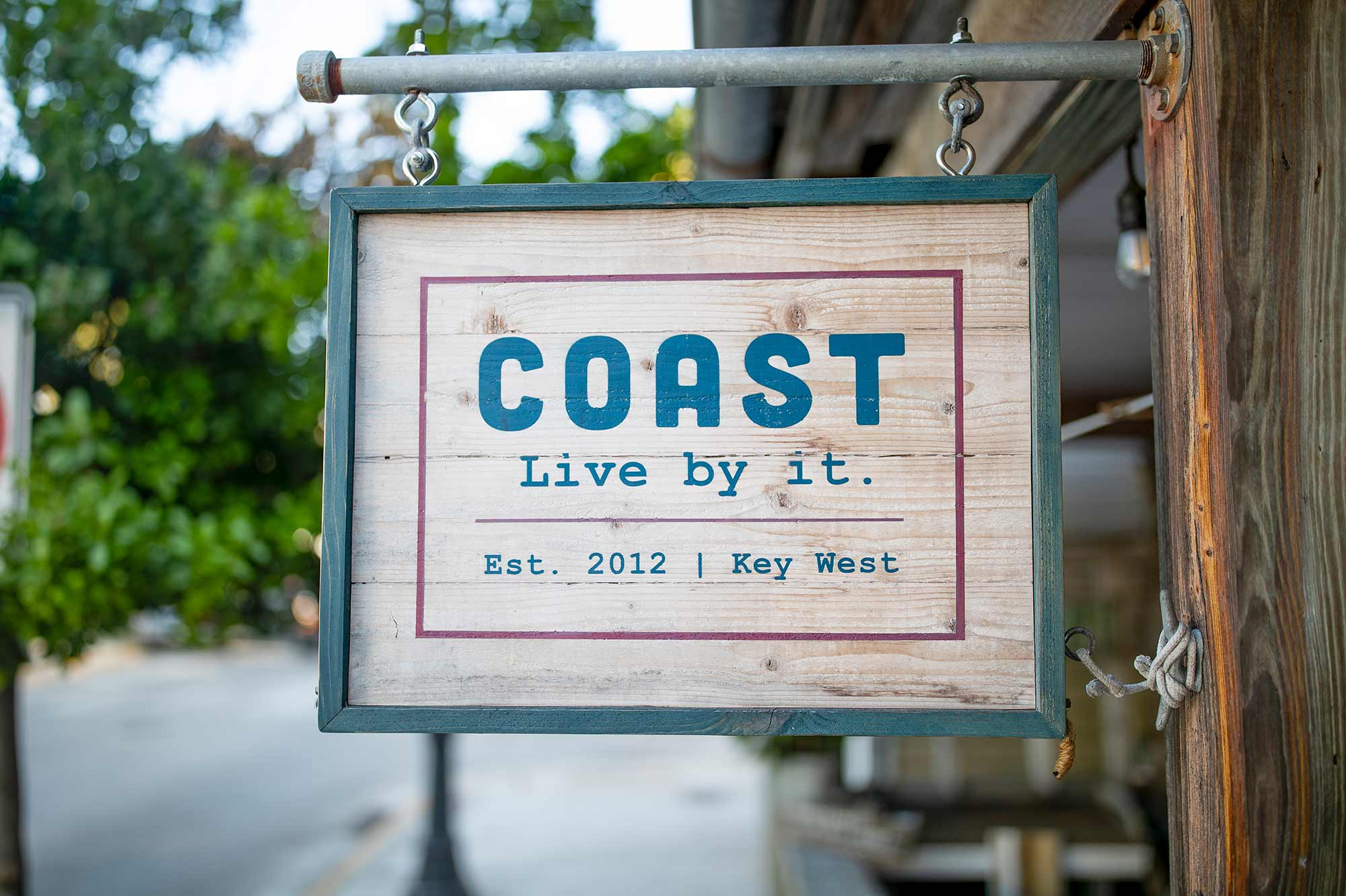 COAST wooden sign